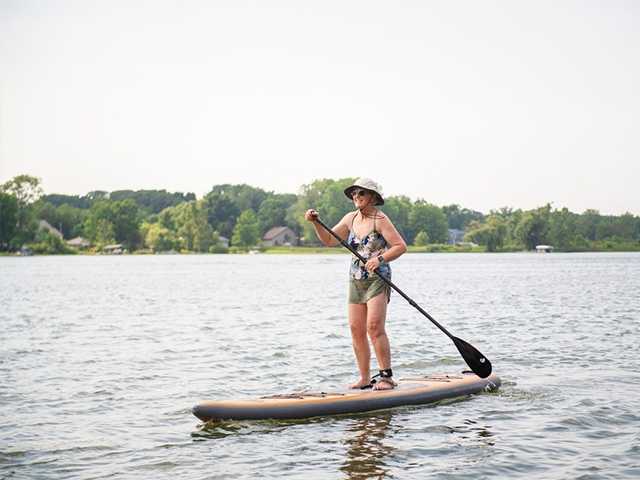 Woman on a paddleboat