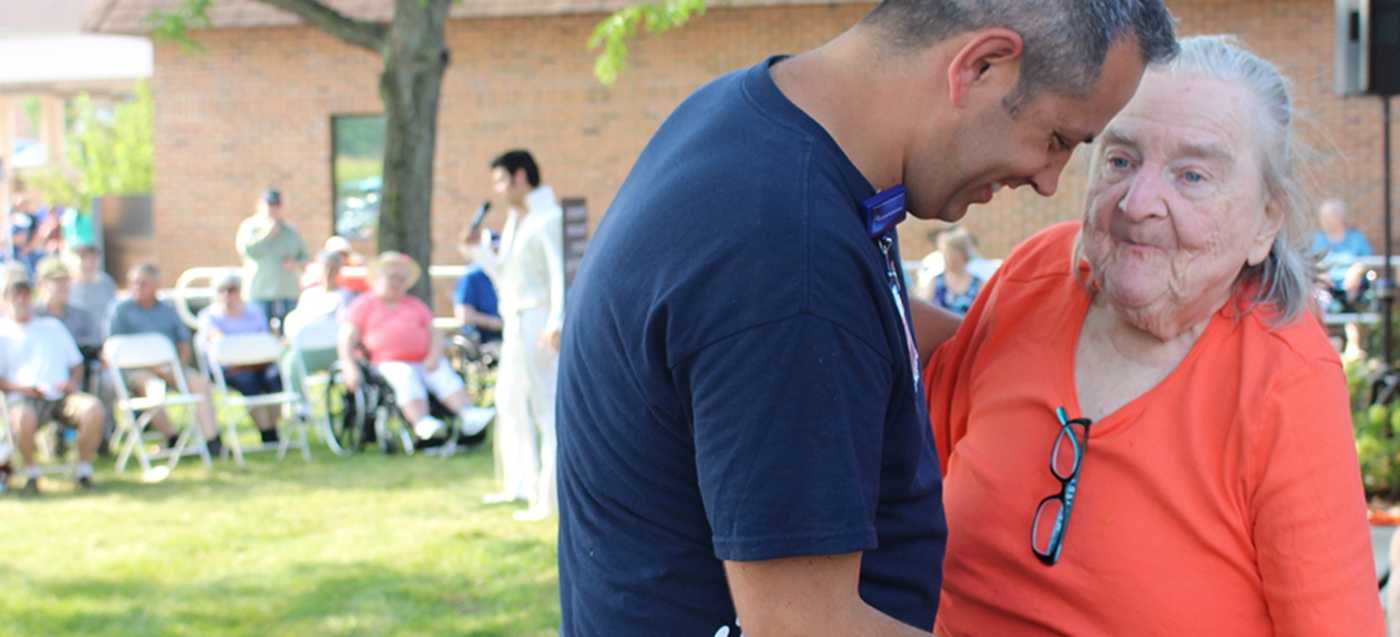 two people at an outdoor gathering